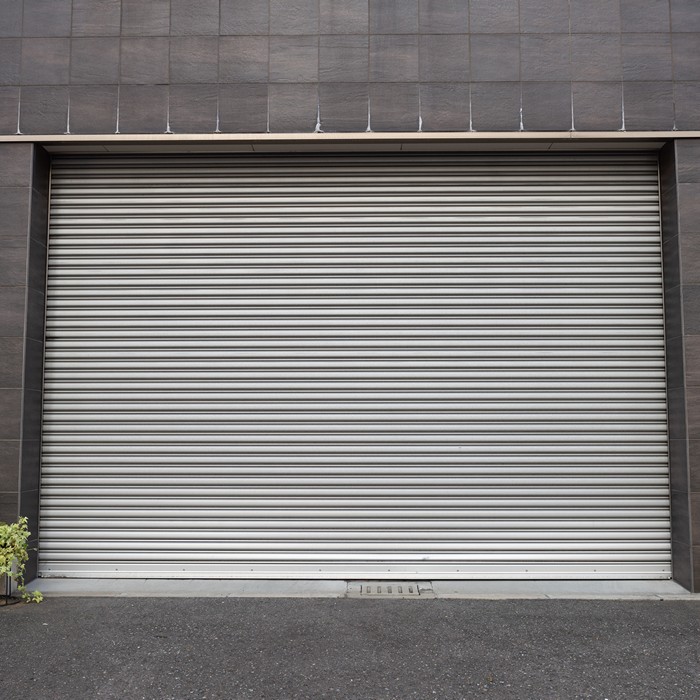 Detailed shot of a high-tension garage door spring